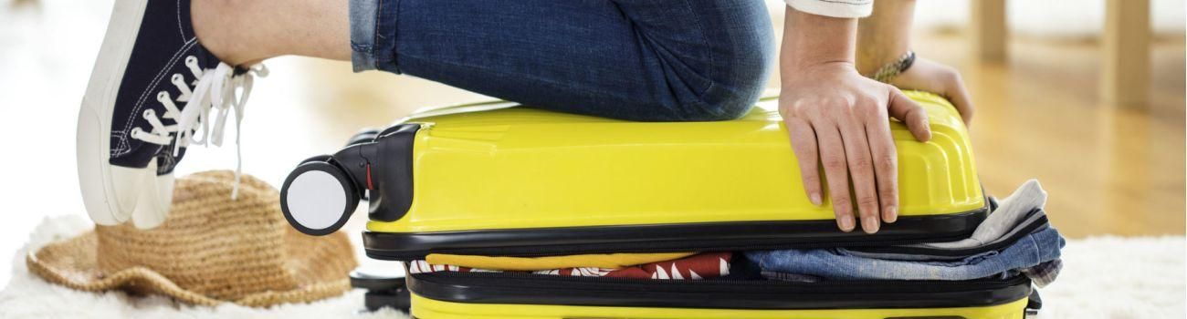 74513352 - preparation travel suitcase at home